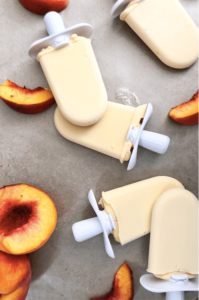 peach popsicles on pan
