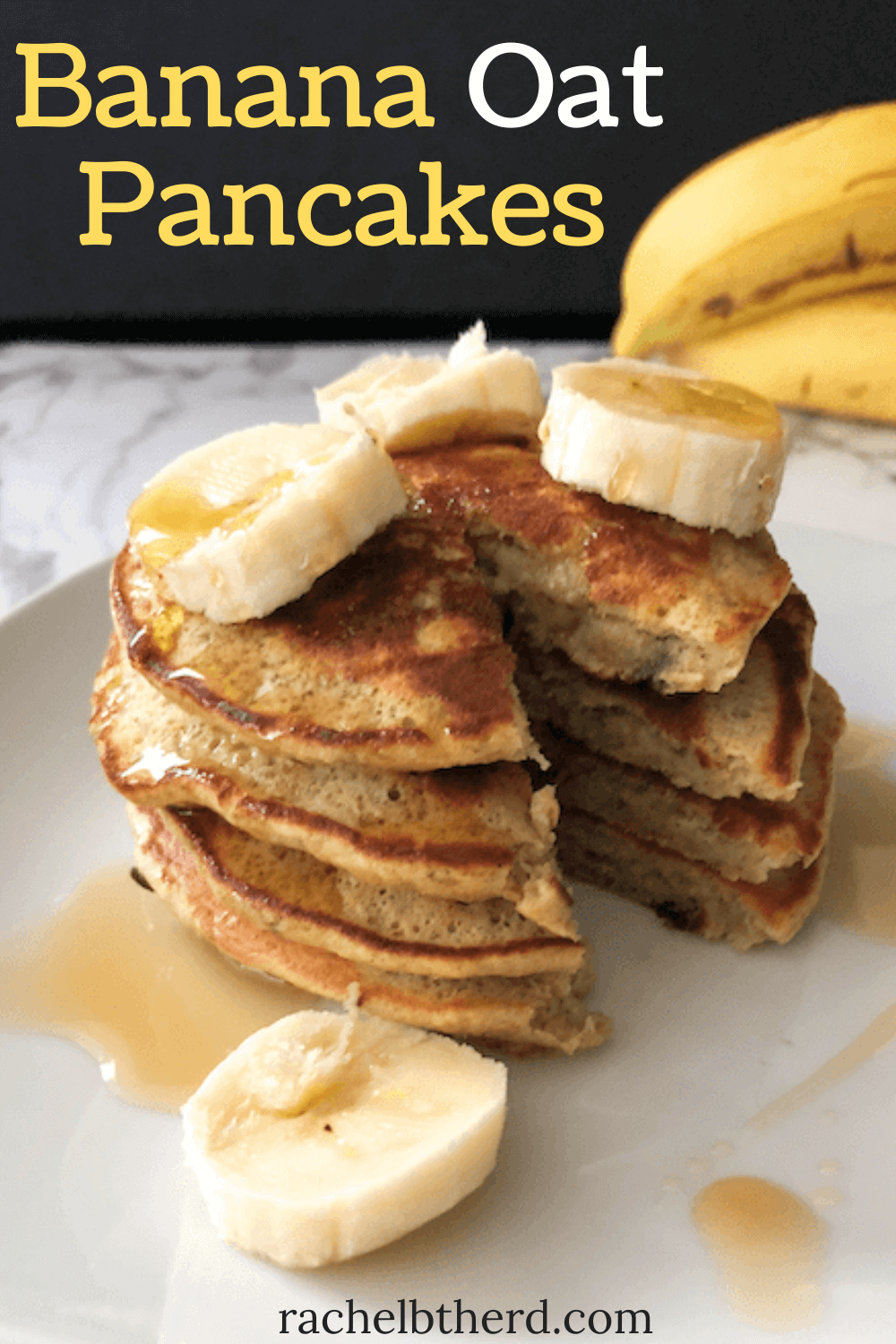 Banana oat pancakes stack with sliced bananas and maple syrup