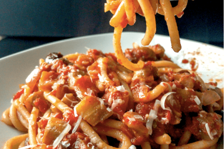 Pasta Puttanesca on a fork