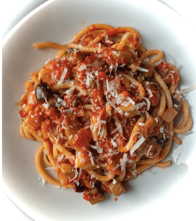 Pasta with a tomato sauce (olives, capers, anchovies, eggplant)