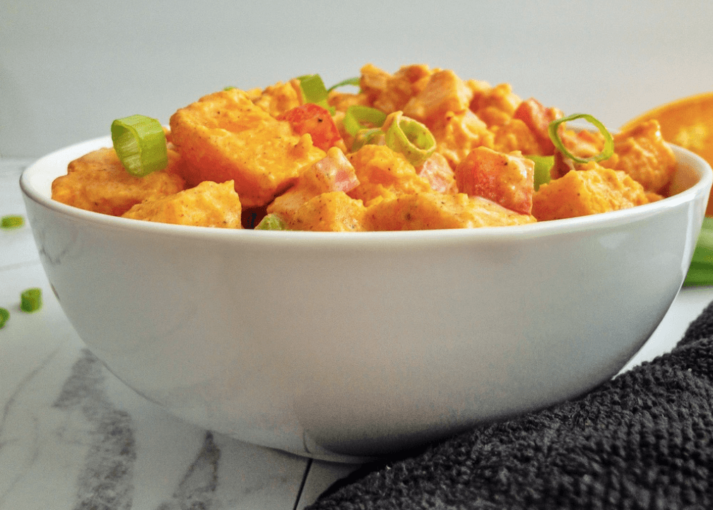 Potato salad side view in a bowl