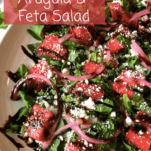 Watermelon, arugula, and feta salad with balsamic glaze drizzled