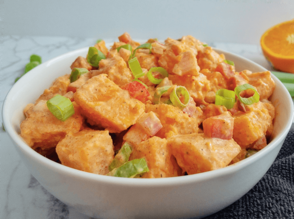 sweet potato summer salad with scallions garnished