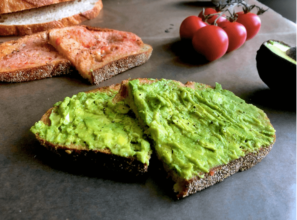 avocado toast on sourdough bread with garlic and tomato