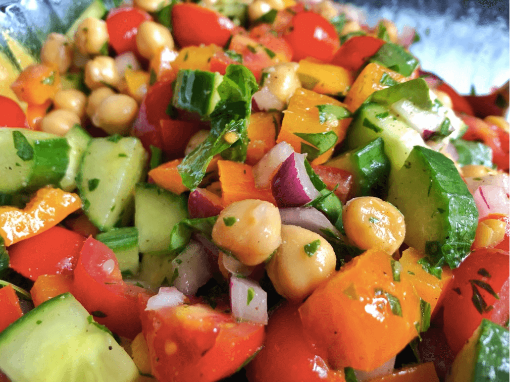 cucumber, tomato salad with chickpeas up close