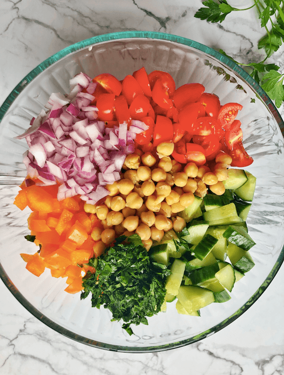summer salad ingredients in a bowl