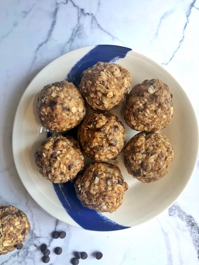 peanut butter oat energy balls on blue plate