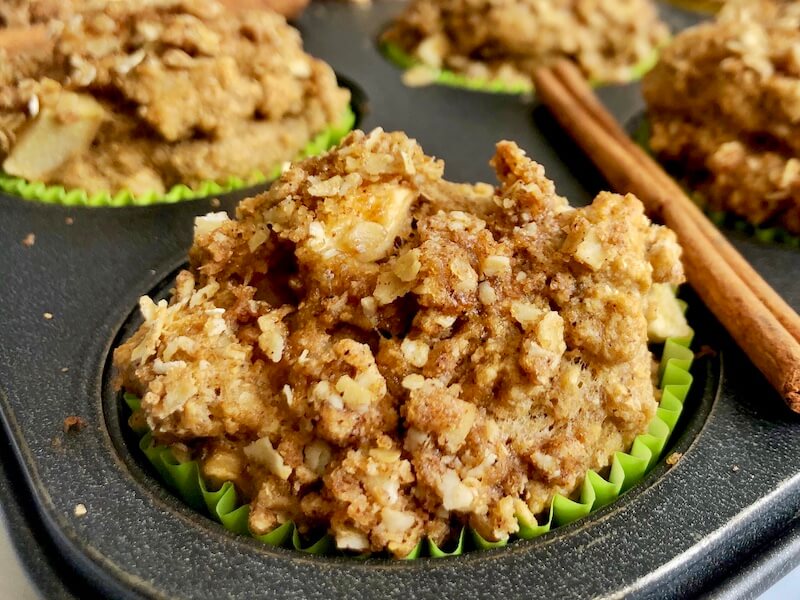 muffin tin with apple oat streusel