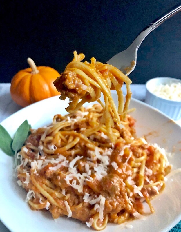 Forkful of pumpkin bolognese spaghetti