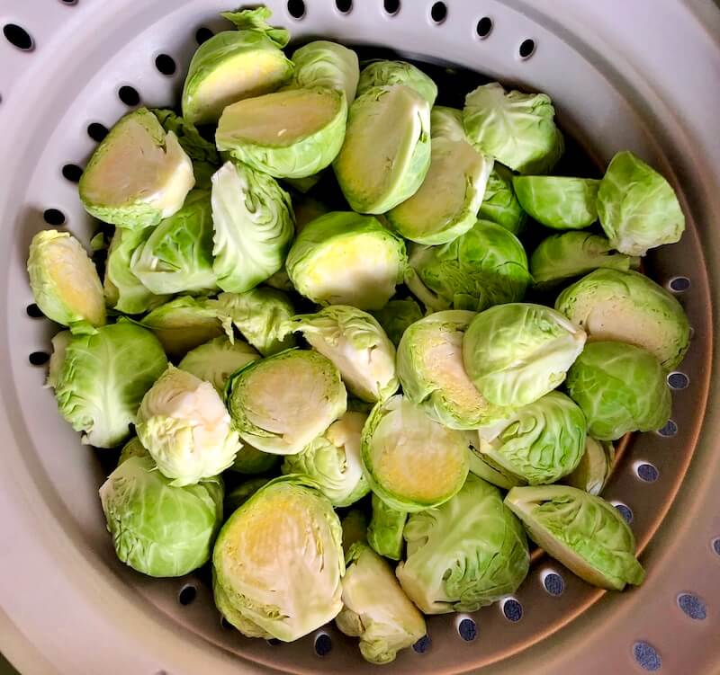 raw brussels sprouts sliced in half