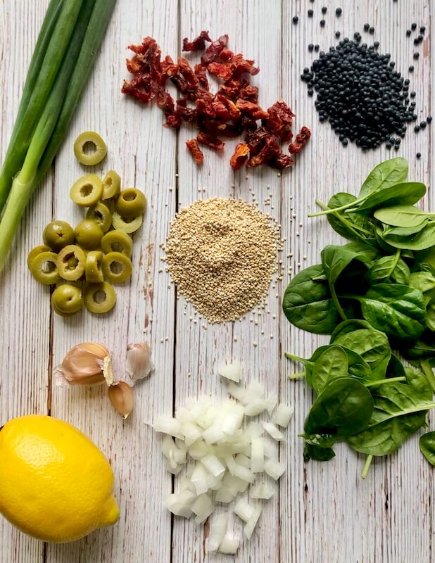 ingredients to make quinoa, lentil salad with mediterranean flavors