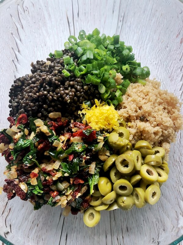 lentils, quinoa, sun-dried tomato, olives, spinach salad