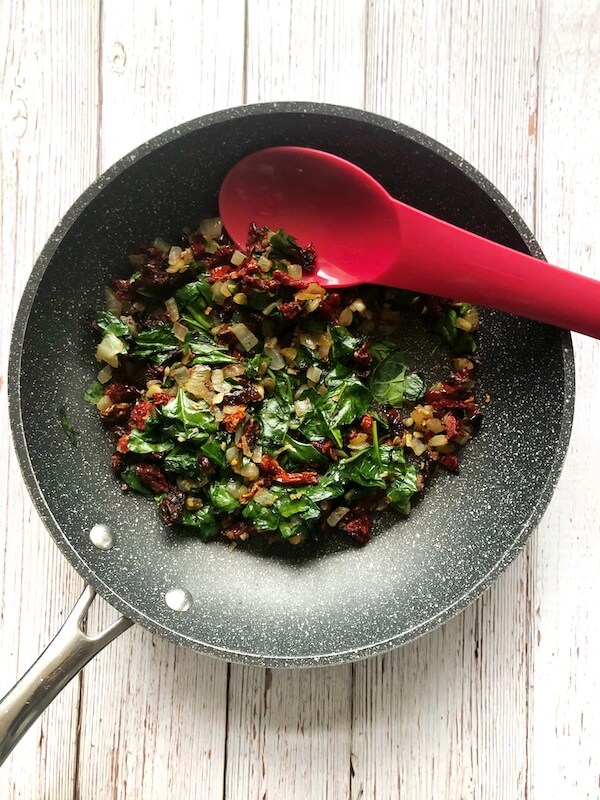 sauteed onion, garlic, spinach and sun-dried tomatoes