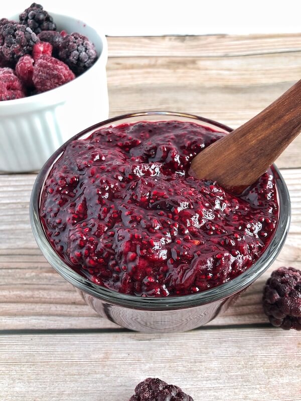 above shot of homemade jam with a spoon