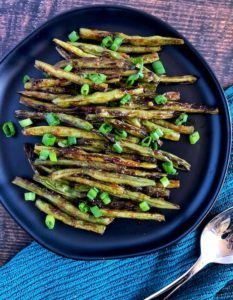 green beans charred with sesame and garlic sauce