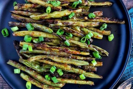 green beans charred with sesame and garlic sauce