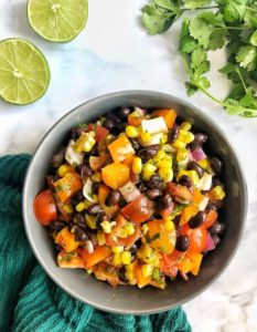 bowl of corn, bean, tomato, pepper salad