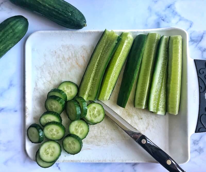 Slicing cucumbers into wedges and rounds