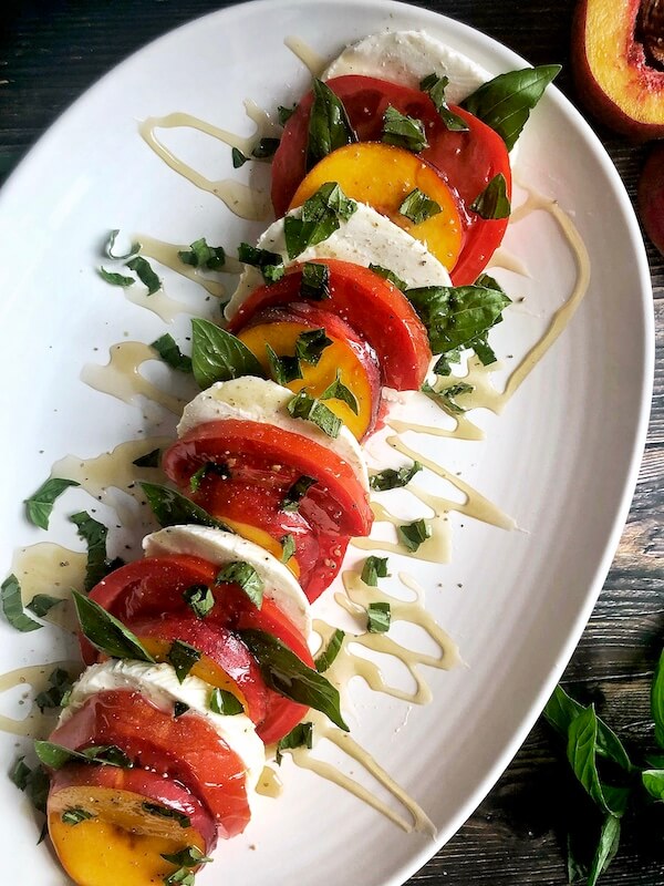 Caprese Salad with tomatoes and peaches