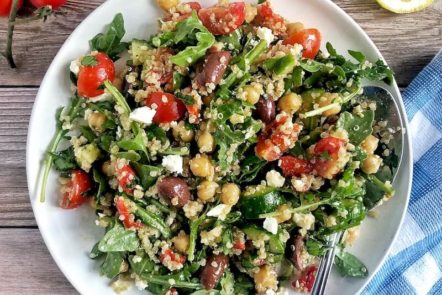 Mediterranean salad with quinoa and arugula