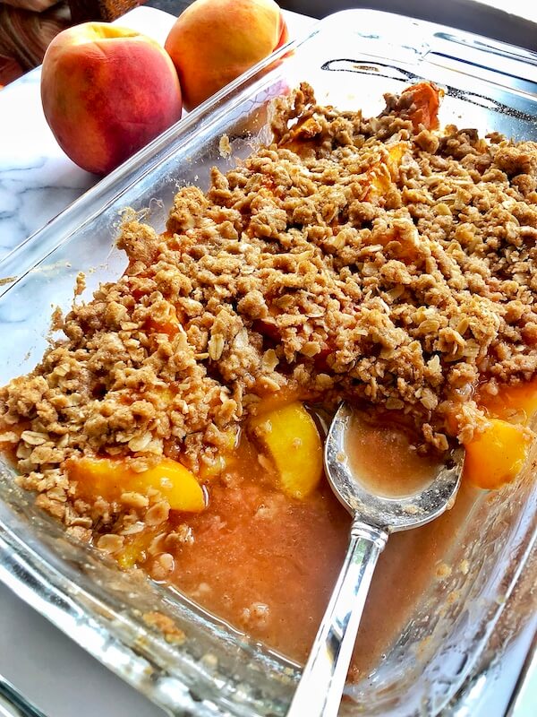 tray of peach with crumb topping
